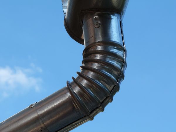 Metal Downspout Installation in Valencia
